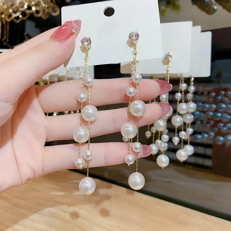 Luxury Pearls Long Earrings For Women New Jewelry Personality Korean Fashion Earings Wholesale
Luxury Pearls Long Earrings For Women New Jewelry Personality Korean Fashion Earings Wholesale