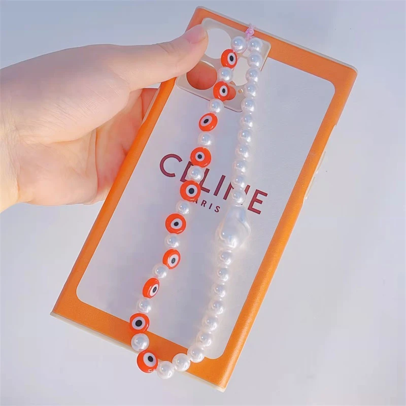 Fashionable Bohemian White Imitation Pearl Beads Mix And Match Red Devil Eyes Women's Mobile Phone Chain Lanyard Jewelry Gifts
Fashionable Bohemian White Imitation Pearl Beads Mix And Match Red Devil Eyes Women's Mobile Phone Chain Lanyard Jewelry Gifts