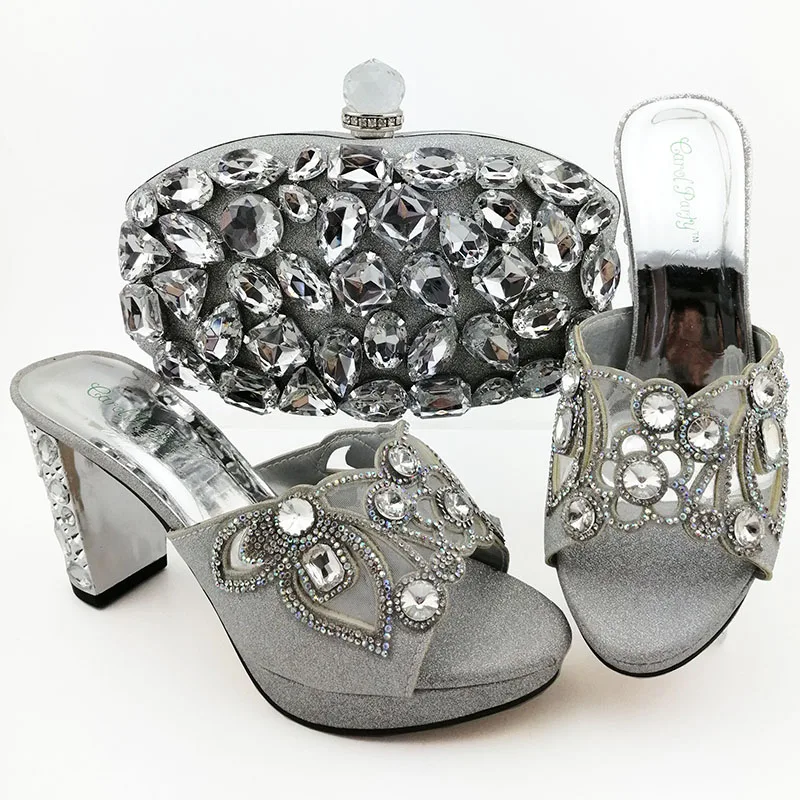 Very popular shoes and school bag set. Ladies Italian design. Silver shoes and handbags decorated with big stones
Very popular shoes and school bag set. Ladies Italian design. Silver shoes and handbags decorated with big stones
