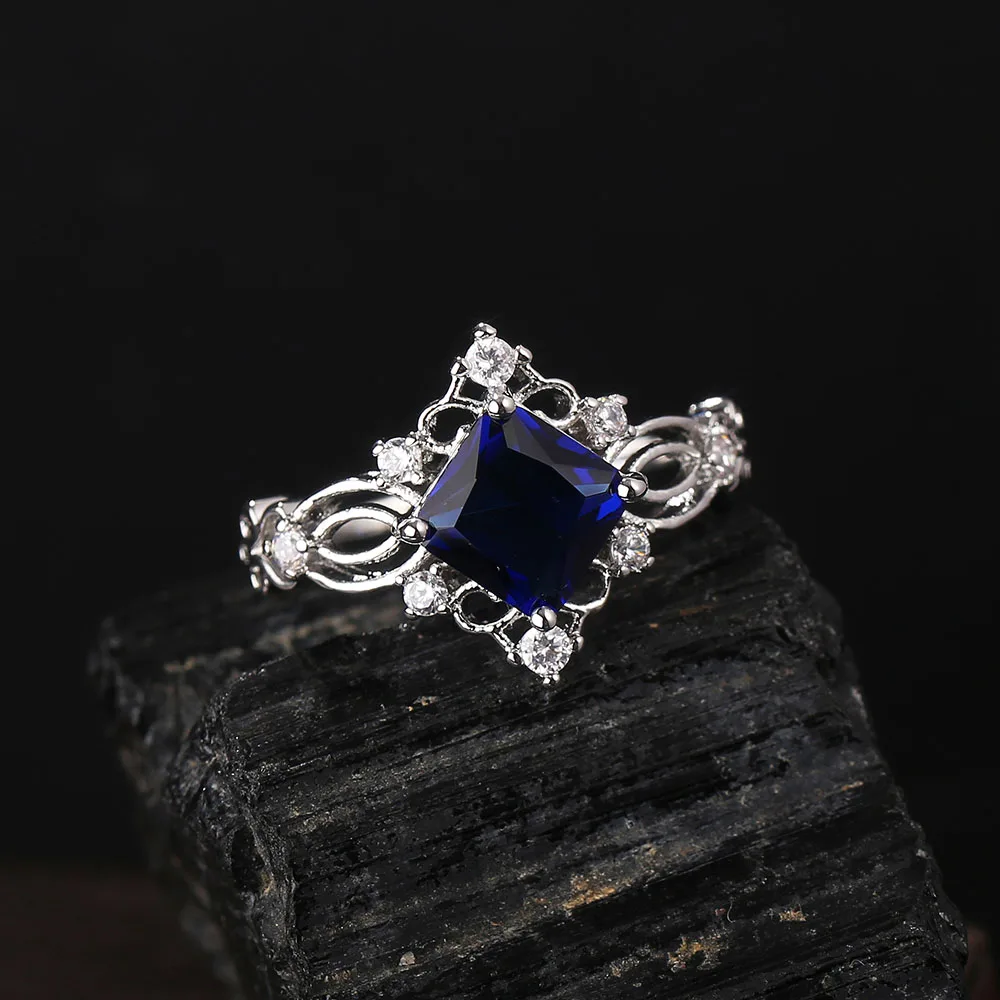 Women Classic Flower Hollow Zircon Rings Zircon Blue Crystal Square Wedding Ring Jewelry Accessories Ring Gift
Women Classic Flower Hollow Zircon Rings Zircon Blue Crystal Square Wedding Ring Jewelry Accessories Ring Gift