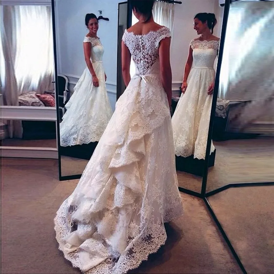Vintage Arabic Vestidos De Noiva A Line Wedding Dresses Bateau Neck with Cap Sleeves Elegant Lace Appliques Bridal Gowns
Vintage Arabic Vestidos De Noiva A Line Wedding Dresses Bateau Neck with Cap Sleeves Elegant Lace Appliques Bridal Gowns