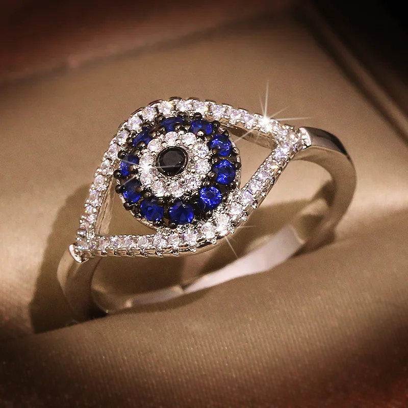 NEW Punk Female Blue Crystal Stone Ring Charm Zircon Silver Color Wedding Jewelry For Women Dainty Evil Eye Hollow Engagement 
NEW Punk Female Blue Crystal Stone Ring Charm Zircon Silver Color Wedding Jewelry For Women Dainty Evil Eye Hollow Engagement