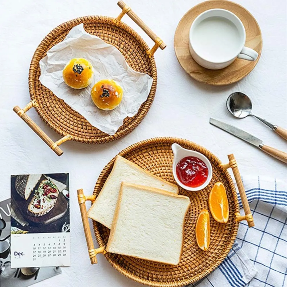 28cm Rattan Handwoven Round Serving Tray Food Storage Plate With Wooden Handles Wicker Basket Wooden Tray For Fruit Breadbasket
28cm Rattan Handwoven Round Serving Tray Food Storage Plate With Wooden Handles Wicker Basket Wooden Tray For Fruit Breadbasket