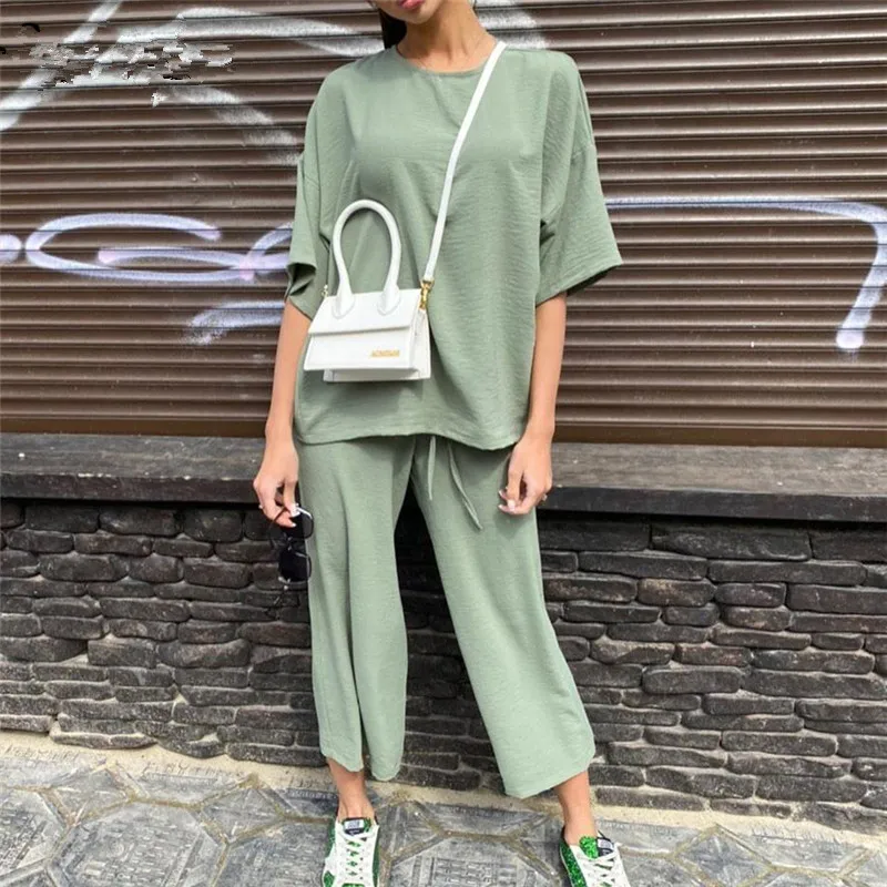 Sexy Fashion Khaki Women's Set Summer Casual Two Piece Set Short Sleeve Tops Shirt And Loose Beach Pants Set Bottom Suit Outfits 
Sexy Fashion Khaki Women's Set Summer Casual Two Piece Set Short Sleeve Tops Shirt And Loose Beach Pants Set Bottom Suit Outfits