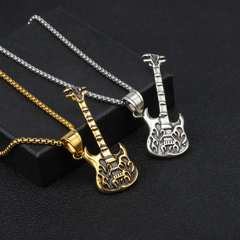 New jewelry titanium steel pendant rock punk hip hop guitar jewelry men and women ghost fire guitar necklace jewelry wholesale
New jewelry titanium steel pendant rock punk hip hop guitar jewelry men and women ghost fire guitar necklace jewelry wholesale