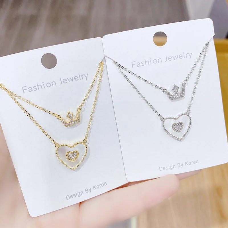 Summer New Shell Stone Heart-shaped Crown Jewelry Pendant Necklace for Woman Exquisite Crystal Choker Clavicle Chain Necklace
Summer New Shell Stone Heart-shaped Crown Jewelry Pendant Necklace for Woman Exquisite Crystal Choker Clavicle Chain Necklace