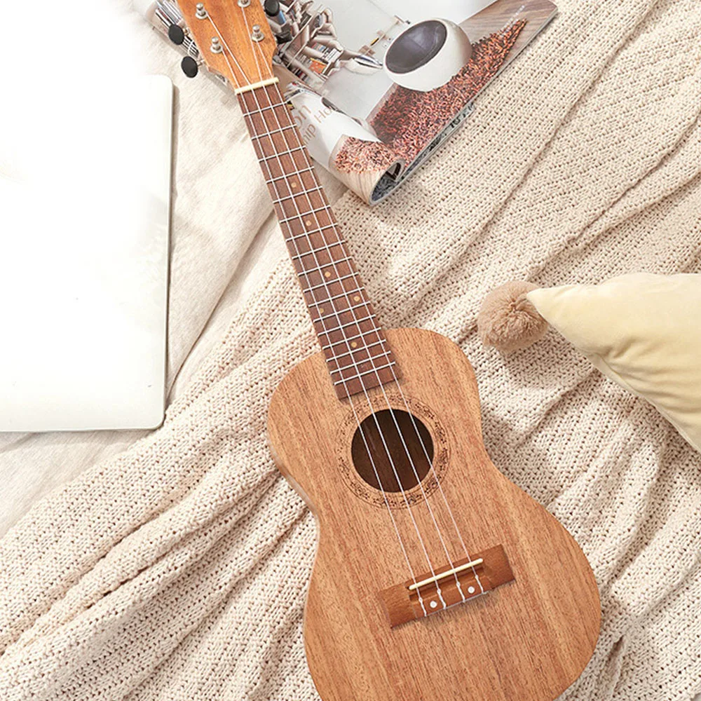 21 inch Kids Imitation Wood UKulele 4-String Portable Guitar Instrument for Children Pick Stringed Instruments Mini Guitars 
21 inch Kids Imitation Wood UKulele 4-String Portable Guitar Instrument for Children Pick Stringed Instruments Mini Guitars