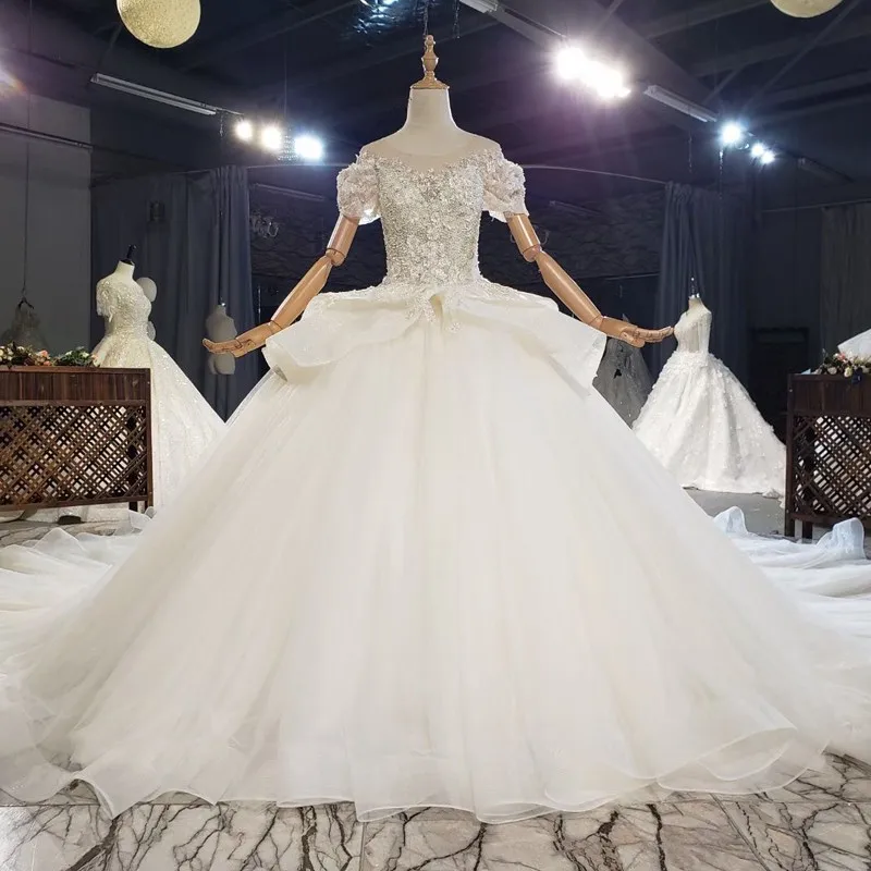 Amazing Mariage Robe De Mariee 2021 Short Sleeves Heavy Beading Wedding Dress Custom Made Luxury Bridal Dresses
Amazing Mariage Robe De Mariee 2021 Short Sleeves Heavy Beading Wedding Dress Custom Made Luxury Bridal Dresses