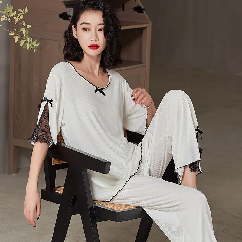 Modal Pajamas Summer Loose Comfortable Bow Short Sleeve Trousers White Thin Section 2-piece Set Women's Clothing Tracksuit
Modal Pajamas Summer Loose Comfortable Bow Short Sleeve Trousers White Thin Section 2-piece Set Women's Clothing Tracksuit