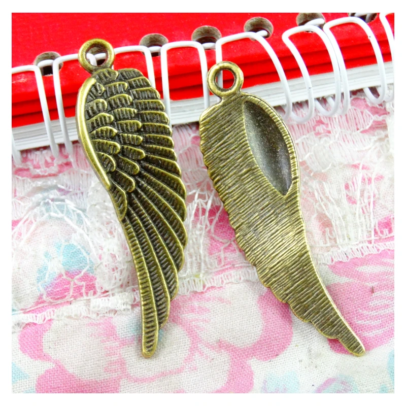20pcs 49x14.1mm Antique Bronze Plated Wings Handmade Charms Pendant DIY for bracelet necklace
20pcs 49x14.1mm Antique Bronze Plated Wings Handmade Charms Pendant DIY for bracelet necklace