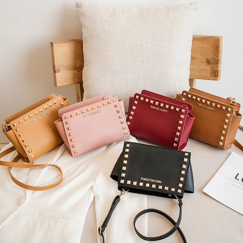 Female Bag 2021 New Rivet Bag Fashion Trend One Shoulder Messenger Bag PU Leather Ladies Shoulder Bag
Female Bag 2021 New Rivet Bag Fashion Trend One Shoulder Messenger Bag PU Leather Ladies Shoulder Bag