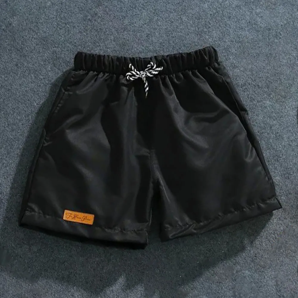 Men's Drawstring Three Piece Shorts Classic Fashion Casual Beach Sports Half Pants Fitness Cool Beachwear Running Surfing Shorts
Men's Drawstring Three Piece Shorts Classic Fashion Casual Beach Sports Half Pants Fitness Cool Beachwear Running Surfing Shorts