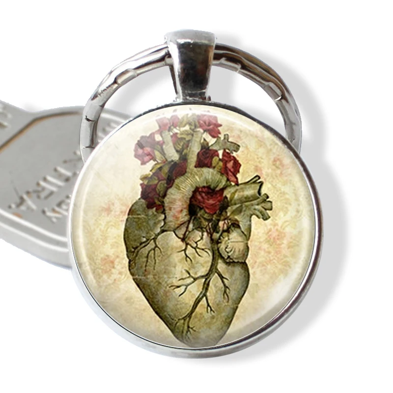 

Heartbeat Sign Pendant Anatomical Heart Keychain Glass Cabochon Jewelry Metal Key Chain Ring Men Doctors Halloween Gift