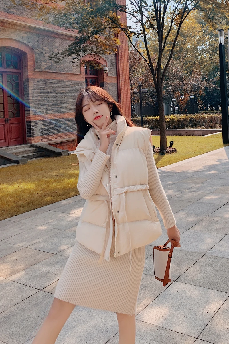 2021 autumn and winter new Korean version of women's solid color drawstring waist pocket loose cotton vest coat
2021 autumn and winter new Korean version of women's solid color drawstring waist pocket loose cotton vest coat