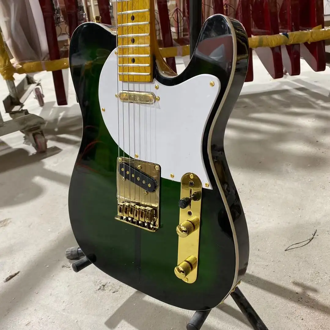 Custom Shop tele guitar vintage sunburst color TL guitar one piece version gold hardware bowlder knobs dog tele guitar retro 3TS
Custom Shop tele guitar vintage sunburst color TL guitar one piece version gold hardware bowlder knobs dog tele guitar retro 3TS