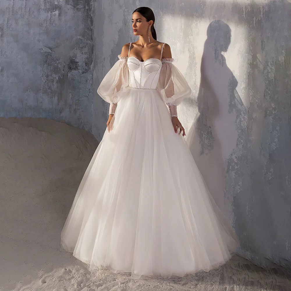 UETEEY Wedding Dress Beading Spaghetti Straps Tulle Sweep Train Plus Size Lace Up Back A-Line Wedding Gowns 2022
UETEEY Wedding Dress Beading Spaghetti Straps Tulle Sweep Train Plus Size Lace Up Back A-Line Wedding Gowns 2022