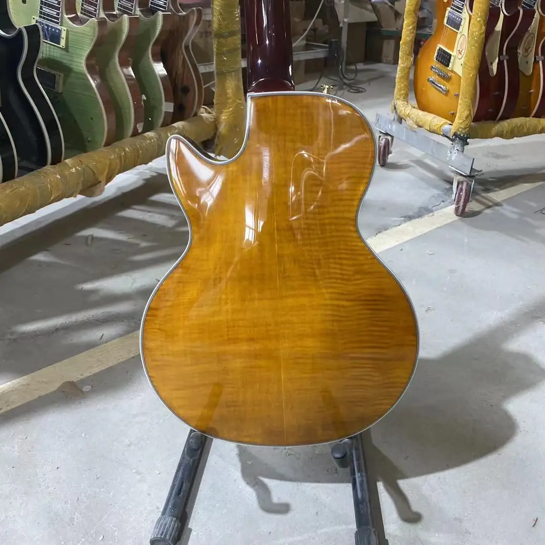 Custom Electric Guitar Tiger Striped Arch Maple Back And Top Hollow Body Gold Hardware Free Shipping
Custom Electric Guitar Tiger Striped Arch Maple Back And Top Hollow Body Gold Hardware Free Shipping
