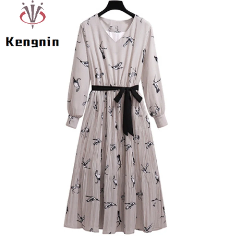 Женское платье-туника с поясом, V-образным вырезом и бантом 
Женское платье-туника с поясом, V-образным вырезом и бантом