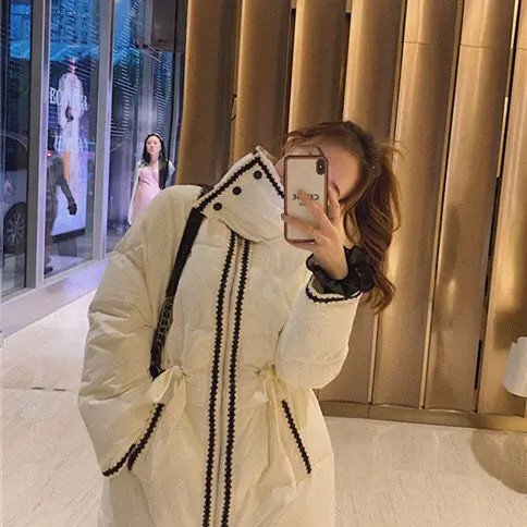 Autumn and Winter new Korean version of loose temperament simple color matching white long cotton-padded jacket women's coat
Autumn and Winter new Korean version of loose temperament simple color matching white long cotton-padded jacket women's coat