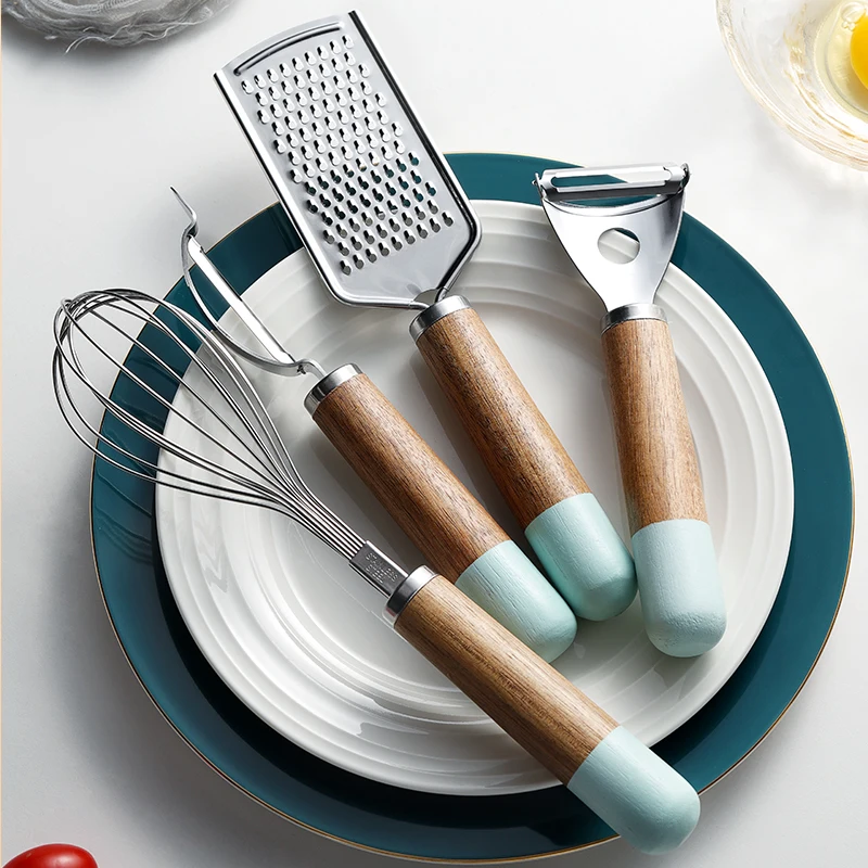 Stainless Steel Kitchen Tool With Wooden Handle Y Style D Style Cutter Grater Hold on Egg Beater
Stainless Steel Kitchen Tool With Wooden Handle Y Style D Style Cutter Grater Hold on Egg Beater