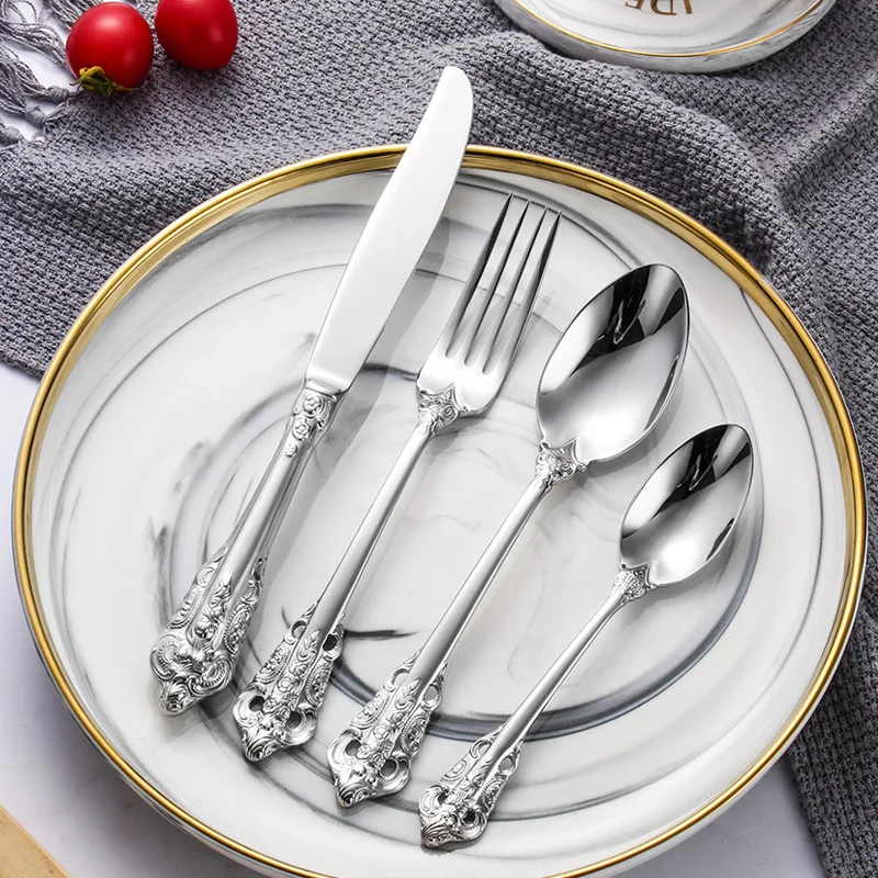 24pcs Tableware gold Titanium carved luxury 304 Stainless Steel Dinnerware Silverware Flatware Set forks knives spoons 
24pcs Tableware gold Titanium carved luxury 304 Stainless Steel Dinnerware Silverware Flatware Set forks knives spoons