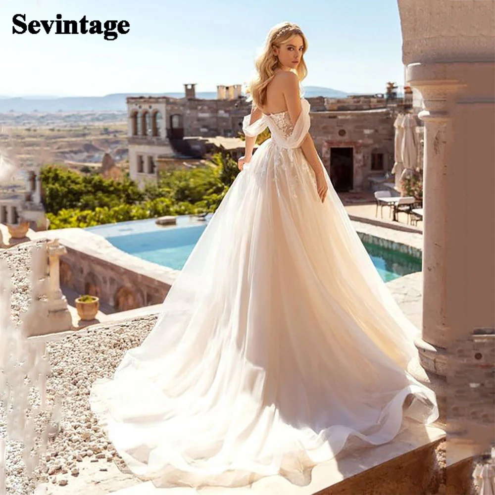 Sevintage Boho Wedding Dresses off the Shoulder Appliques Lace A-Line Beach Wedding Gown Princess Bride Dress Custom Made 
Sevintage Boho Wedding Dresses off the Shoulder Appliques Lace A-Line Beach Wedding Gown Princess Bride Dress Custom Made