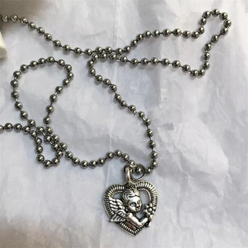 Vintage Harajuku Gothic Silver Color Heart Shaped Angel Cupid Pendant Chain Necklaces For Women Men Egirl Trendy Jewelry
Vintage Harajuku Gothic Silver Color Heart Shaped Angel Cupid Pendant Chain Necklaces For Women Men Egirl Trendy Jewelry