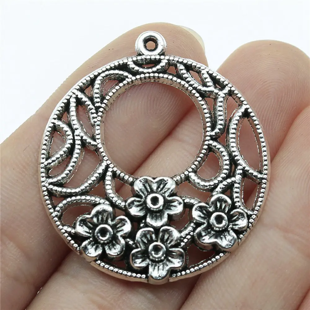 Wholesale Metal Charms Lot 1pcs Hollow Round Flower Earring Connector Charms 38x34mm 
Wholesale Metal Charms Lot 1pcs Hollow Round Flower Earring Connector Charms 38x34mm