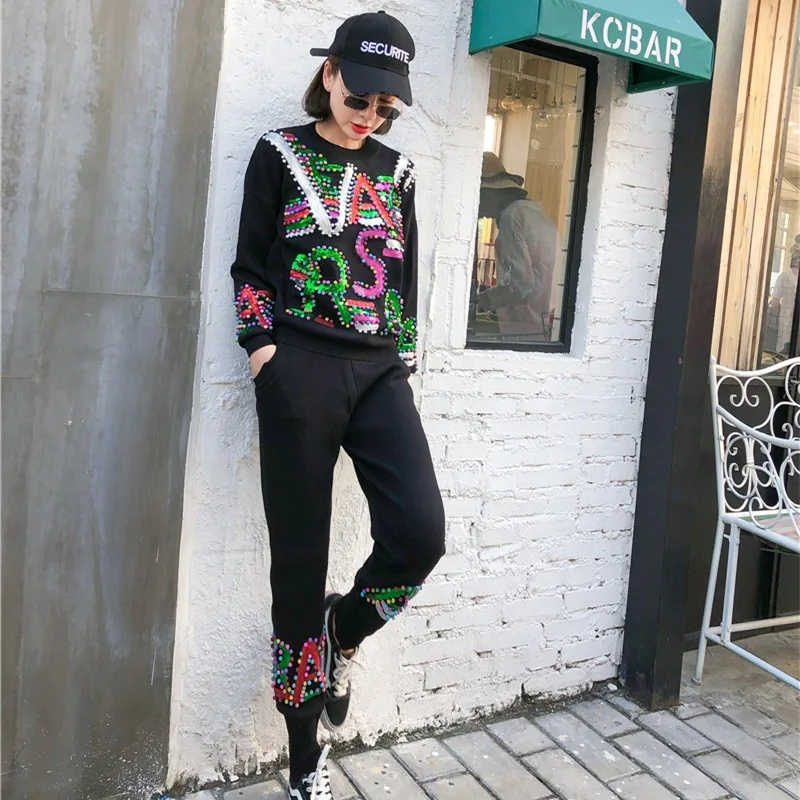 Autumn And Winter Sequins Letters Knit Tracksuit Women 2 Piece Set Loose Beading Sweater and Pants Two-Piece Suit
Autumn And Winter Sequins Letters Knit Tracksuit Women 2 Piece Set Loose Beading Sweater and Pants Two-Piece Suit