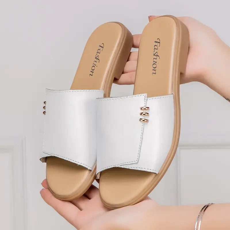 Leather large size women's slippers flat bottomed anti slip and versatile one word sandals for pregnant women 
Leather large size women's slippers flat bottomed anti slip and versatile one word sandals for pregnant women