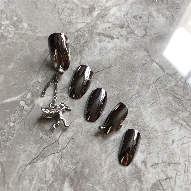 Gothic Angel Metallic silver pure color 3d fake nails American punk style lady full nail tips middle-long false nails
Gothic Angel Metallic silver pure color 3d fake nails American punk style lady full nail tips middle-long false nails