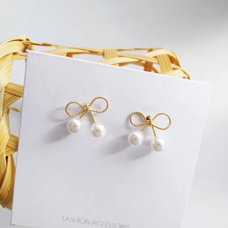 New Bow Pearl Stud Earrings for Women Top Designer Luxury Creativity High Quality Jewelry S925 Needle Wedding Party Girls Gift
New Bow Pearl Stud Earrings for Women Top Designer Luxury Creativity High Quality Jewelry S925 Needle Wedding Party Girls Gift