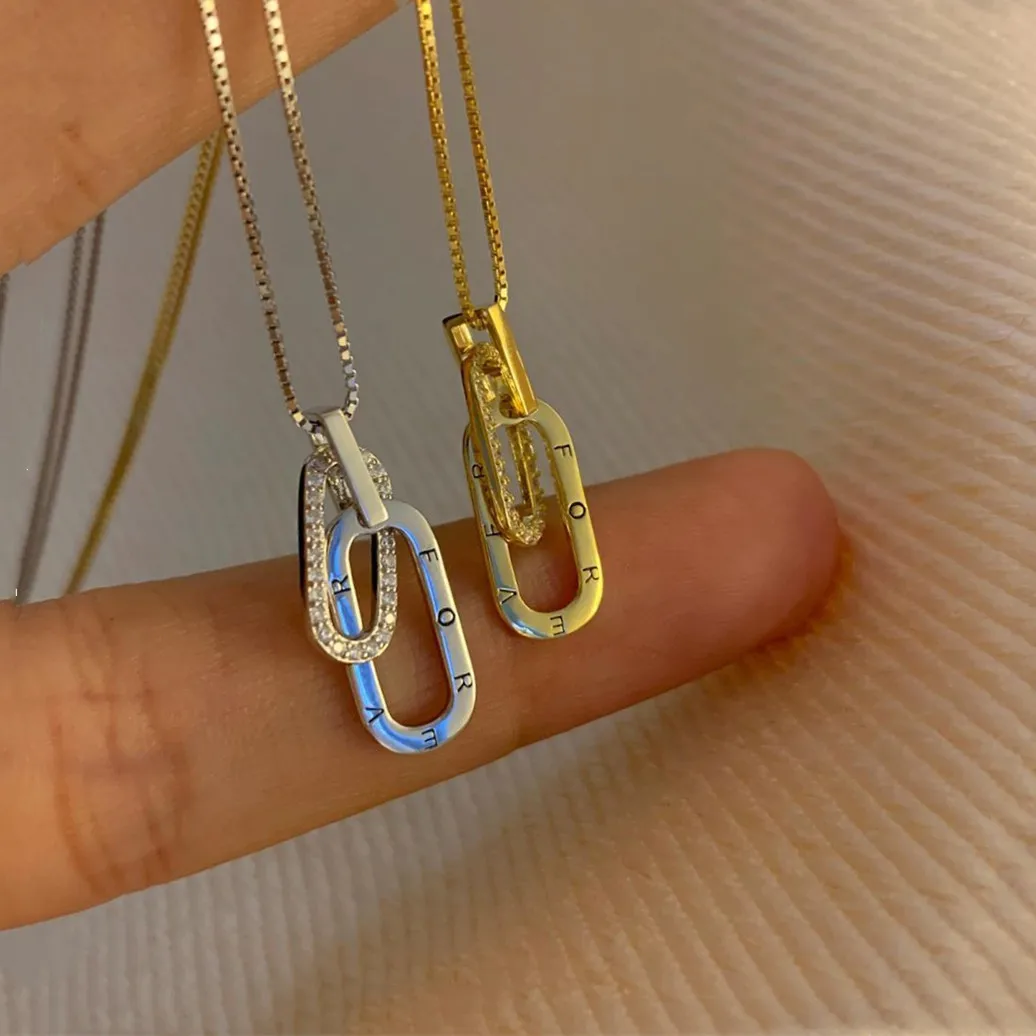 New Trend Letter Double Ring Interlocking Necklace Female Niche Design Inlaid Zircon Oval Pendant Clavicle Chain
New Trend Letter Double Ring Interlocking Necklace Female Niche Design Inlaid Zircon Oval Pendant Clavicle Chain