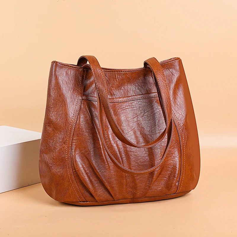 Retro soft leather handbag large volume simple shoulder bag for women autumn/winter 2021 fashion bag versatile tote bag
Retro soft leather handbag large volume simple shoulder bag for women autumn/winter 2021 fashion bag versatile tote bag