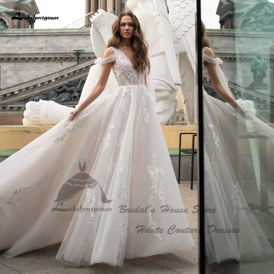 Lakshmigown Sexy Wedding Dress V neck Off White Tulle Princess Bridal Wedding Gowns Open Back 2022 Vestido Suknia Slubna
Lakshmigown Sexy Wedding Dress V neck Off White Tulle Princess Bridal Wedding Gowns Open Back 2022 Vestido Suknia Slubna