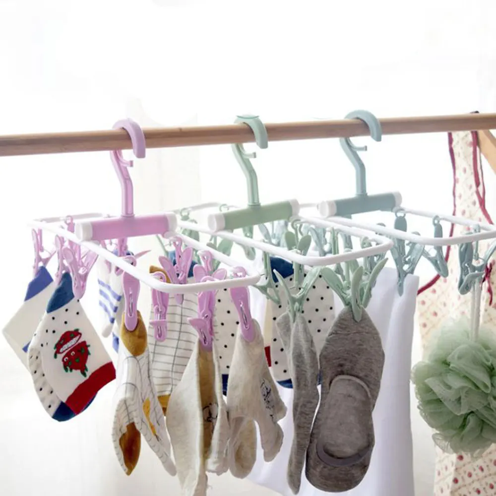 Creative home furnishing foldable hangers, underwear and socks clips, windproof and non-slip plastic drying clips
Creative home furnishing foldable hangers, underwear and socks clips, windproof and non-slip plastic drying clips