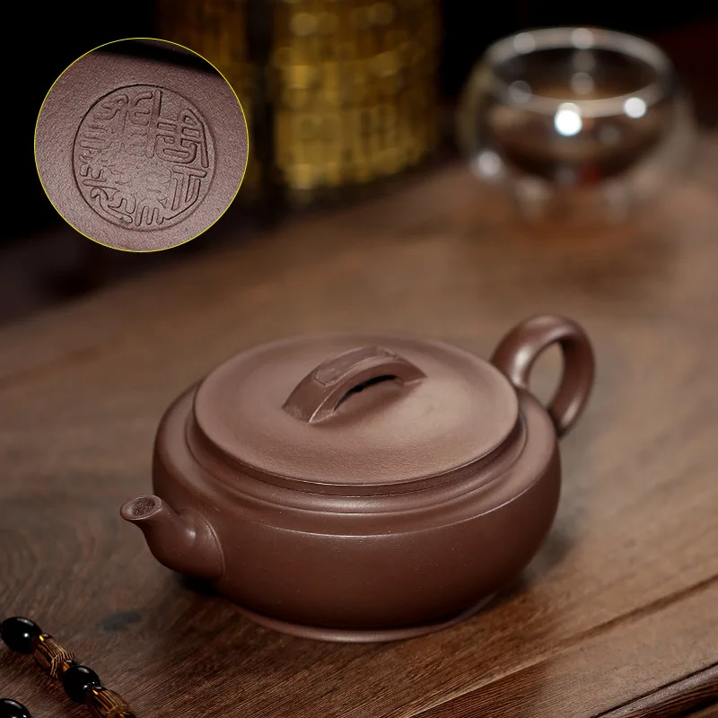 Yixing purple clay teapot special price stale old purple clay flat jade household Kungfu Teapot Tea Set
Yixing purple clay teapot special price stale old purple clay flat jade household Kungfu Teapot Tea Set