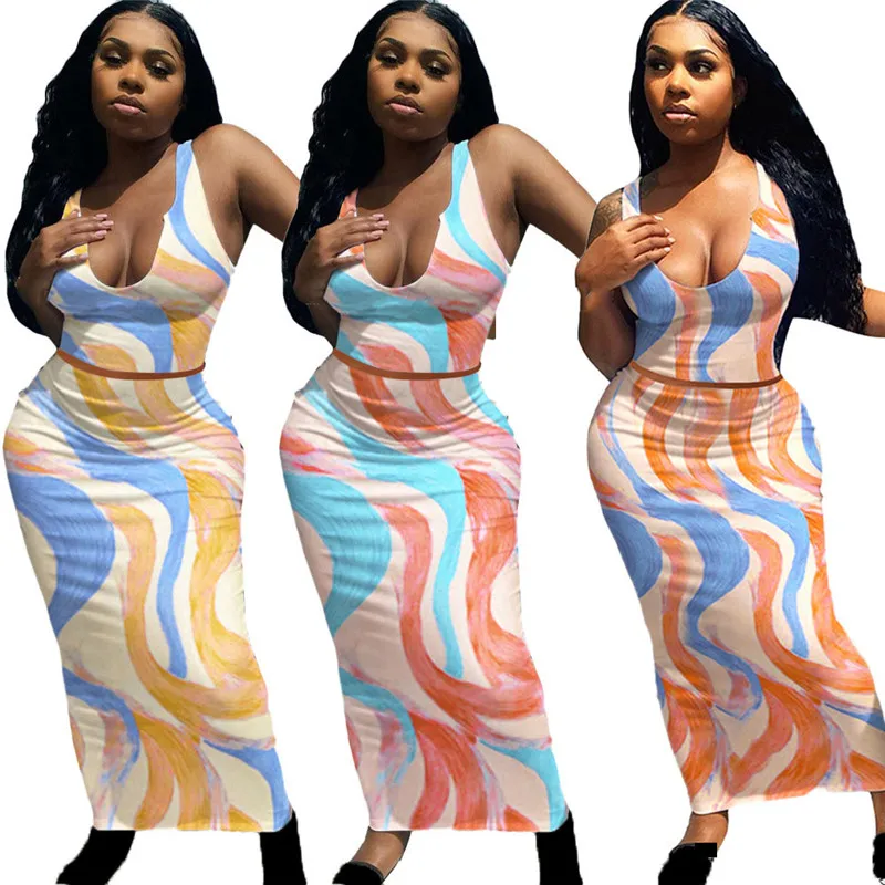 WUHE Colorful Print 2 Piece Suits Deep V Neck Off Shoulder Sleeveless Hollow Out Sexy Tanks Top and Slim Skirts Party Club Wear
WUHE Colorful Print 2 Piece Suits Deep V Neck Off Shoulder Sleeveless Hollow Out Sexy Tanks Top and Slim Skirts Party Club Wear