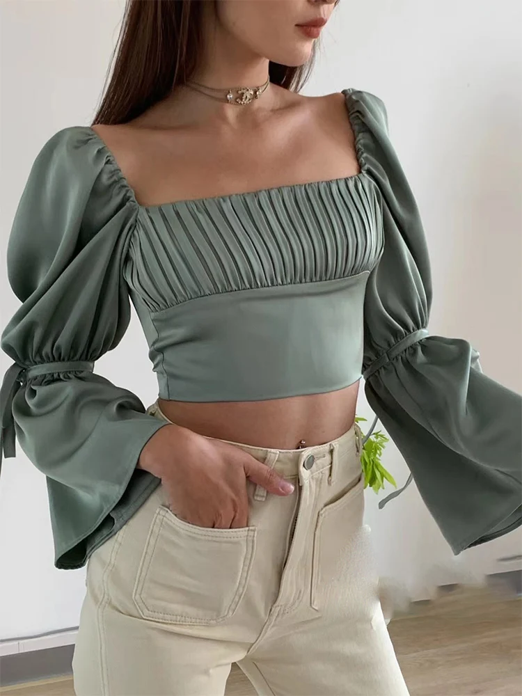 French retro trumpet long-sleeved one-shoulder blouse summer bow tie straps mint green square collar pleated shirt
French retro trumpet long-sleeved one-shoulder blouse summer bow tie straps mint green square collar pleated shirt