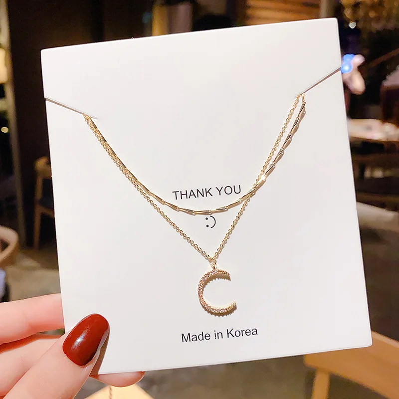Korean version of Moon Zircon Pendant Necklace Feminine Light Luxury Double Layer High Quality Clavicle Chain 
Korean version of Moon Zircon Pendant Necklace Feminine Light Luxury Double Layer High Quality Clavicle Chain