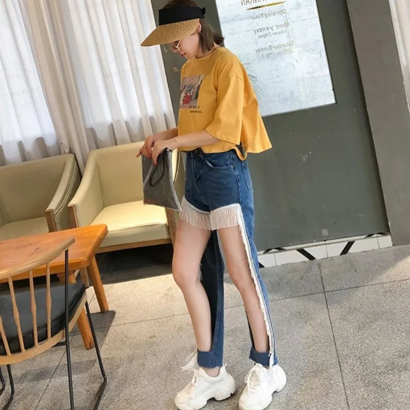 Streetwear Hollow Out Tassel Jeans Woman Summer Fashion High Waist Denim Pencil Pants Solid Blue Loose Cool Jeans Mujer 2020
Streetwear Hollow Out Tassel Jeans Woman Summer Fashion High Waist Denim Pencil Pants Solid Blue Loose Cool Jeans Mujer 2020