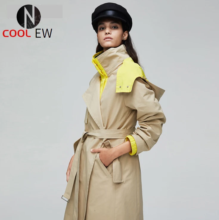 British casual windbreaker new autumn and winter women's hooded long sleeve contrast color over the knee tie coat women
British casual windbreaker new autumn and winter women's hooded long sleeve contrast color over the knee tie coat women