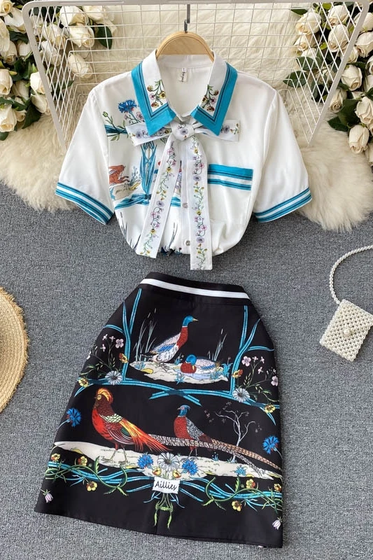 Fashion light mature female suit bow tie lapel short-sleeved shirt top high waist printed A-line skirt two-piece female
Fashion light mature female suit bow tie lapel short-sleeved shirt top high waist printed A-line skirt two-piece female