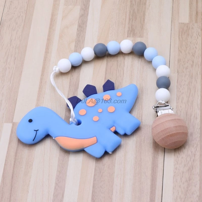 Silicone Teething Pacifier Clips With Dinosaur Silicone Teether Pacifier Chain for Baby Chew Toys
Silicone Teething Pacifier Clips With Dinosaur Silicone Teether Pacifier Chain for Baby Chew Toys