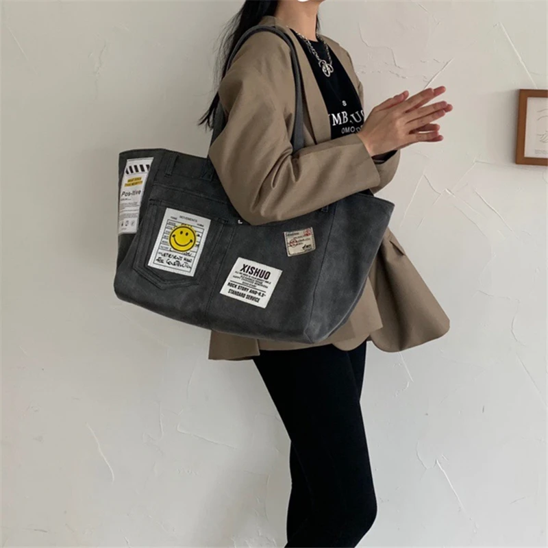 2020 Autumn Products Female Bag Personality Female Tote Bag Military Cloth Badge Denim Canvas Bag Large Capacity Shoulder Bags
2020 Autumn Products Female Bag Personality Female Tote Bag Military Cloth Badge Denim Canvas Bag Large Capacity Shoulder Bags