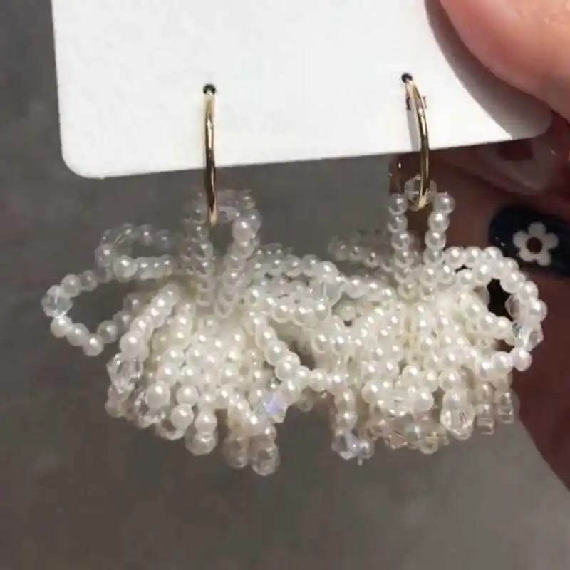 South Korea bead flower fairy dream big earrings temperament eardrop socialite crystal texture of pearl earrings
South Korea bead flower fairy dream big earrings temperament eardrop socialite crystal texture of pearl earrings