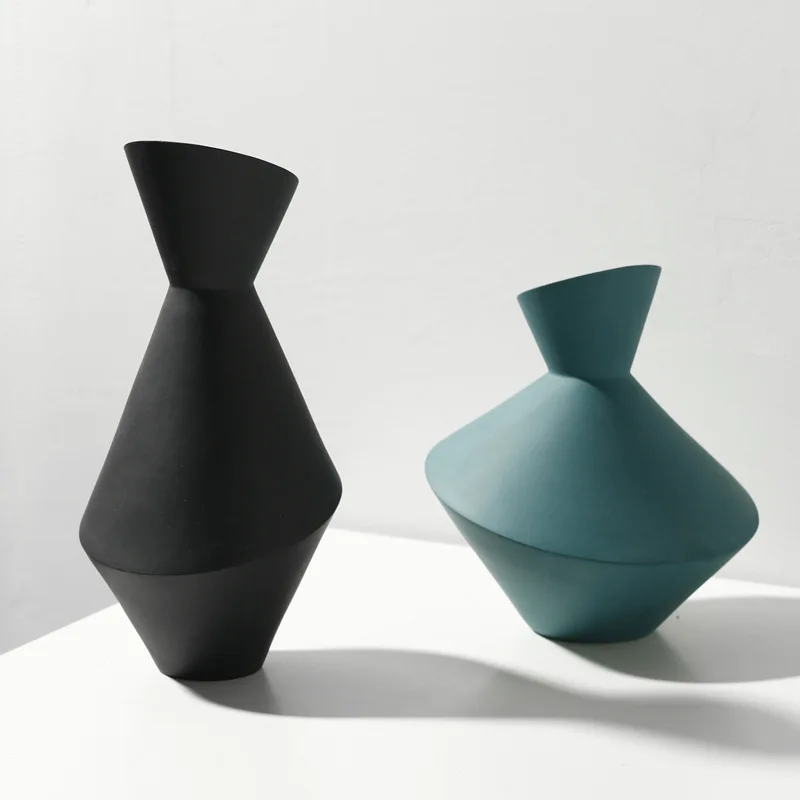 Nordic style home furnishings creative vase Abstract crafts living room soft geometric ceramic flower
Nordic style home furnishings creative vase Abstract crafts living room soft geometric ceramic flower