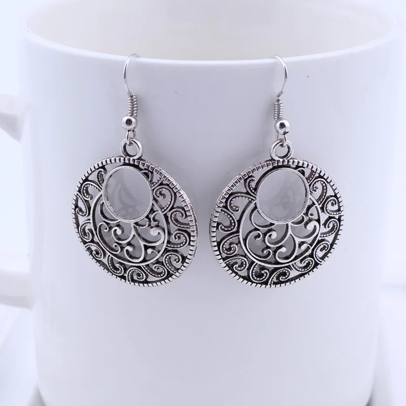 Fashion Statement Bohemian Vintage Ethnic Long Big Hollow Round Drop Earring Carved Flowers Drop Earrings Women 
Fashion Statement Bohemian Vintage Ethnic Long Big Hollow Round Drop Earring Carved Flowers Drop Earrings Women