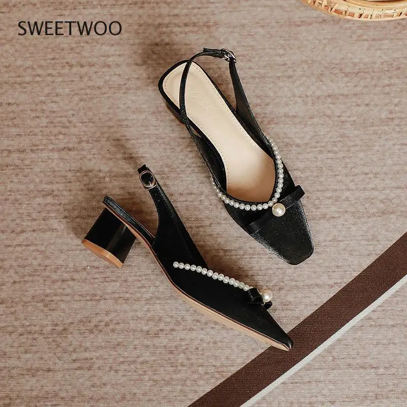 2021 Summer Pearl Bow Chunky High Heel Baotou Sandals Chunky Pointed Buckle Sandals Satin Korean Version Wild Female Cool Shoes
2021 Summer Pearl Bow Chunky High Heel Baotou Sandals Chunky Pointed Buckle Sandals Satin Korean Version Wild Female Cool Shoes