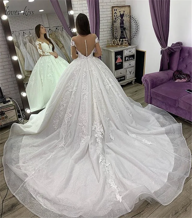 Lover Kiss Vestido Noiva Wedding Gowns Bride Dress Long Sleeves Lace Appliques Beaded Scoop Bridal Gown vestido de casamento
Lover Kiss Vestido Noiva Wedding Gowns Bride Dress Long Sleeves Lace Appliques Beaded Scoop Bridal Gown vestido de casamento